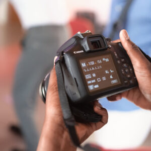 Reviewing shots on the camera during a Lux Photo Club session
