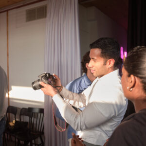 Photographers with cameras at a Lux Photo Club event